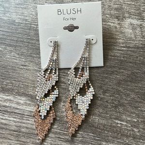 Rhinestone dangling earrings. Color sliver and blush pink color.